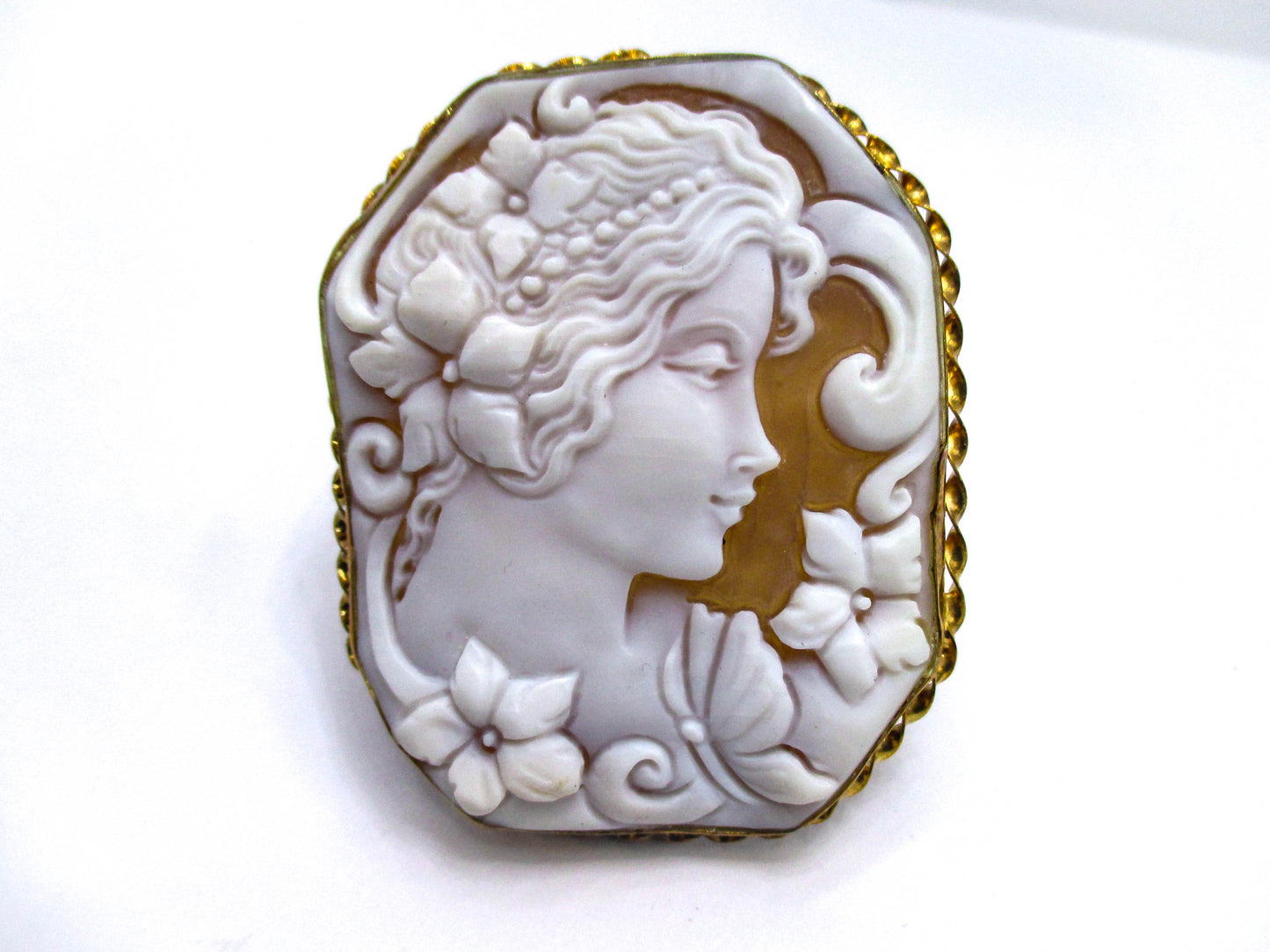 Carved Shell Cameo of a Young Lady, Some Flowers, and her Butterfly