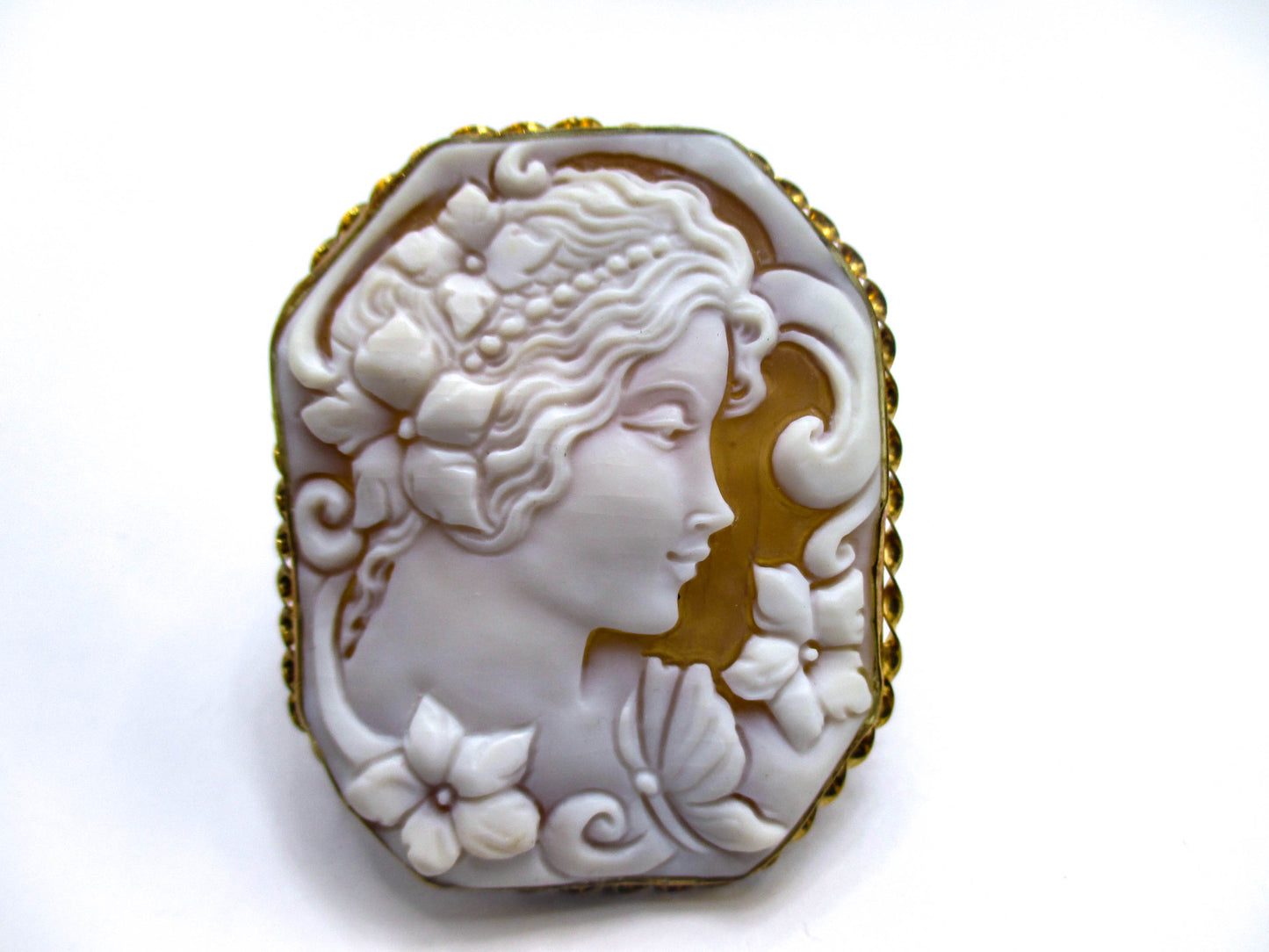 Carved Shell Cameo of a Young Lady, Some Flowers, and her Butterfly