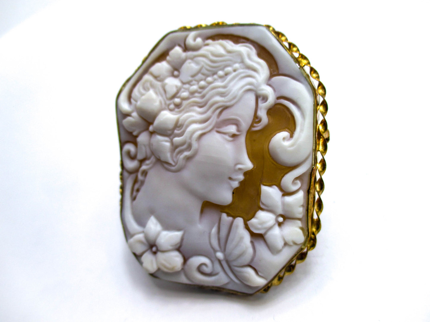 Carved Shell Cameo of a Young Lady, Some Flowers, and her Butterfly