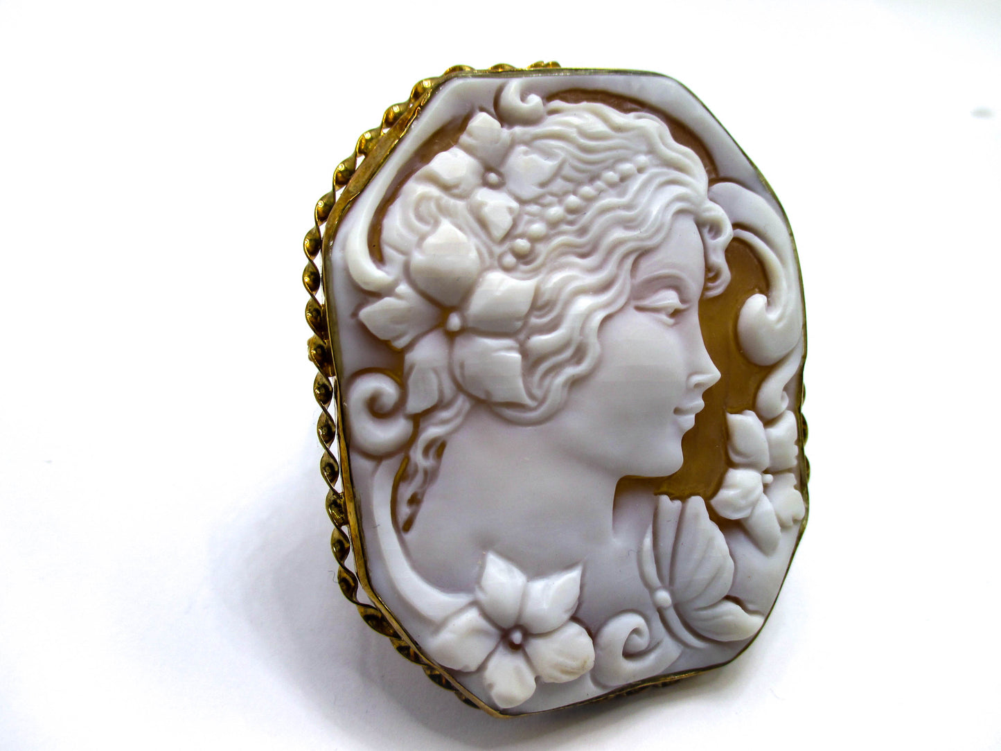 Carved Shell Cameo of a Young Lady, Some Flowers, and her Butterfly