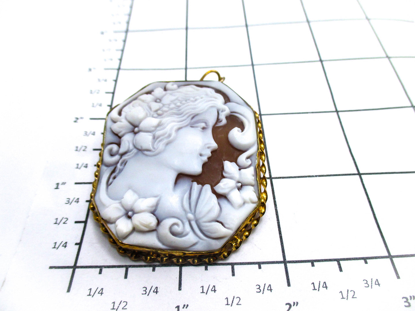 Carved Shell Cameo of a Young Lady, Some Flowers, and her Butterfly